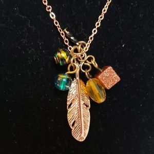 Rose Gold Feather Pendant and Charm Necklace